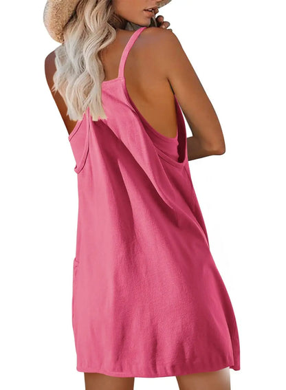 Mini robe combi-short d'été dos nu & décolleté profond. Tissu stretch (coton/poly) pour un confort absolu.