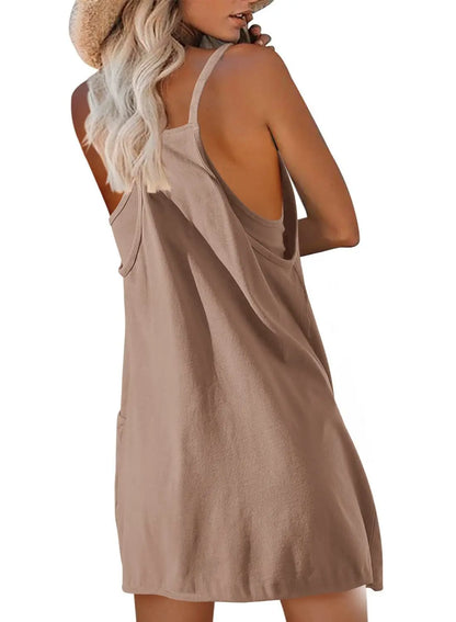 Mini robe combi-short d'été dos nu & décolleté profond. Tissu stretch (coton/poly) pour un confort absolu.